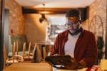 Frustrated small business owner worrying about having to file for bankruptcy.
